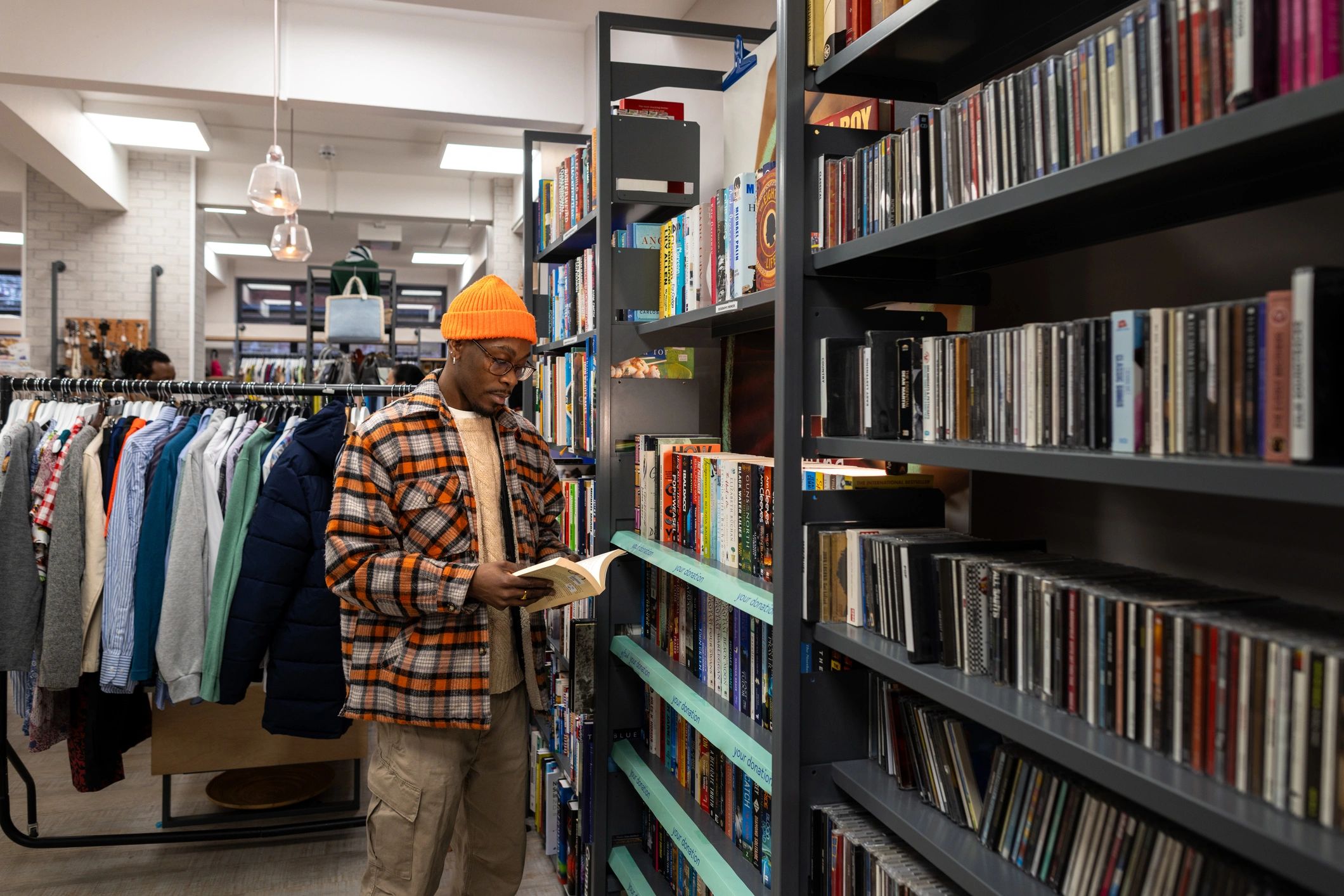 Reader browsing books for research and discovery