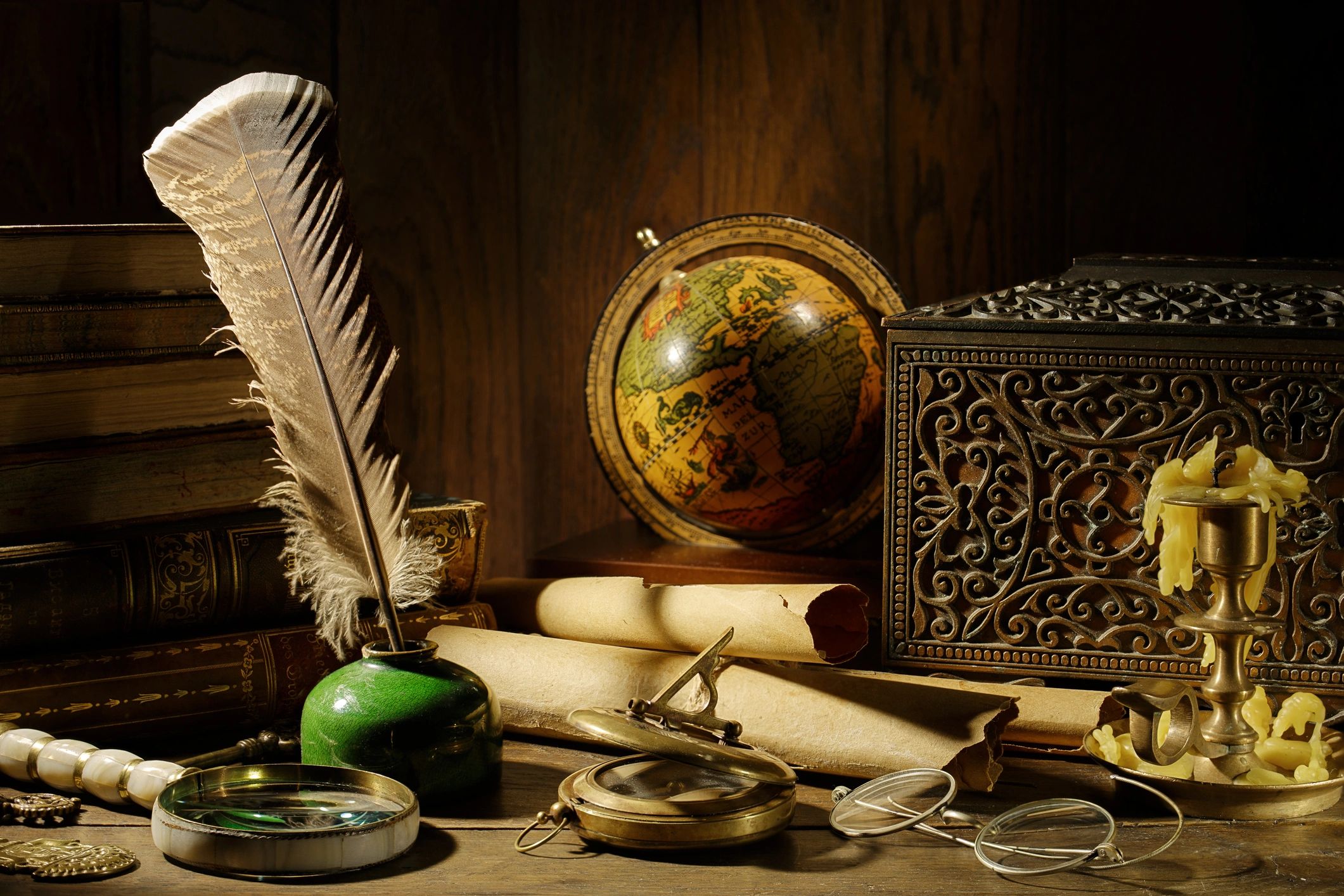 Vintage study with maps, books, and navigation tools