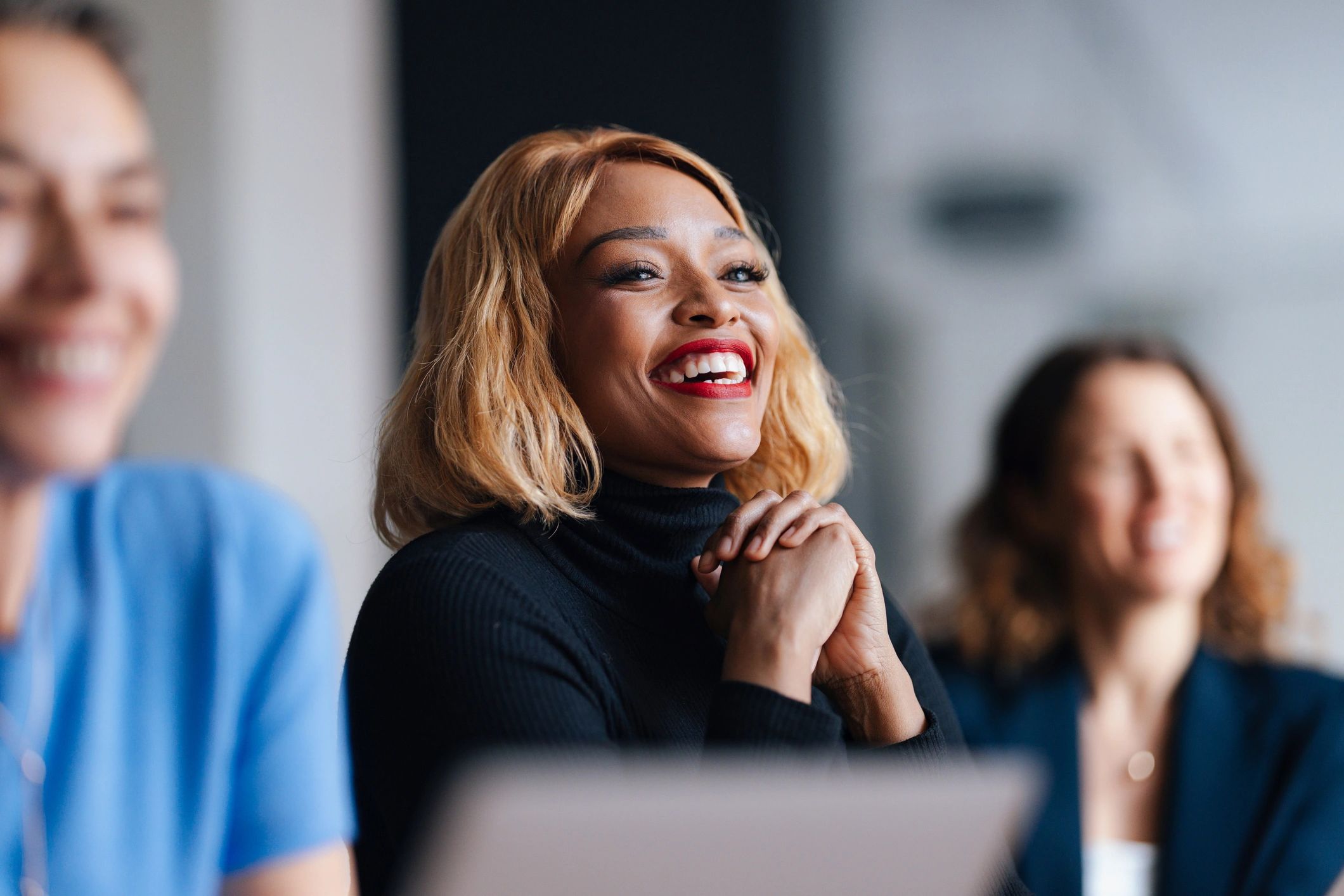 Businesswoman participating in a collaborative office meeting